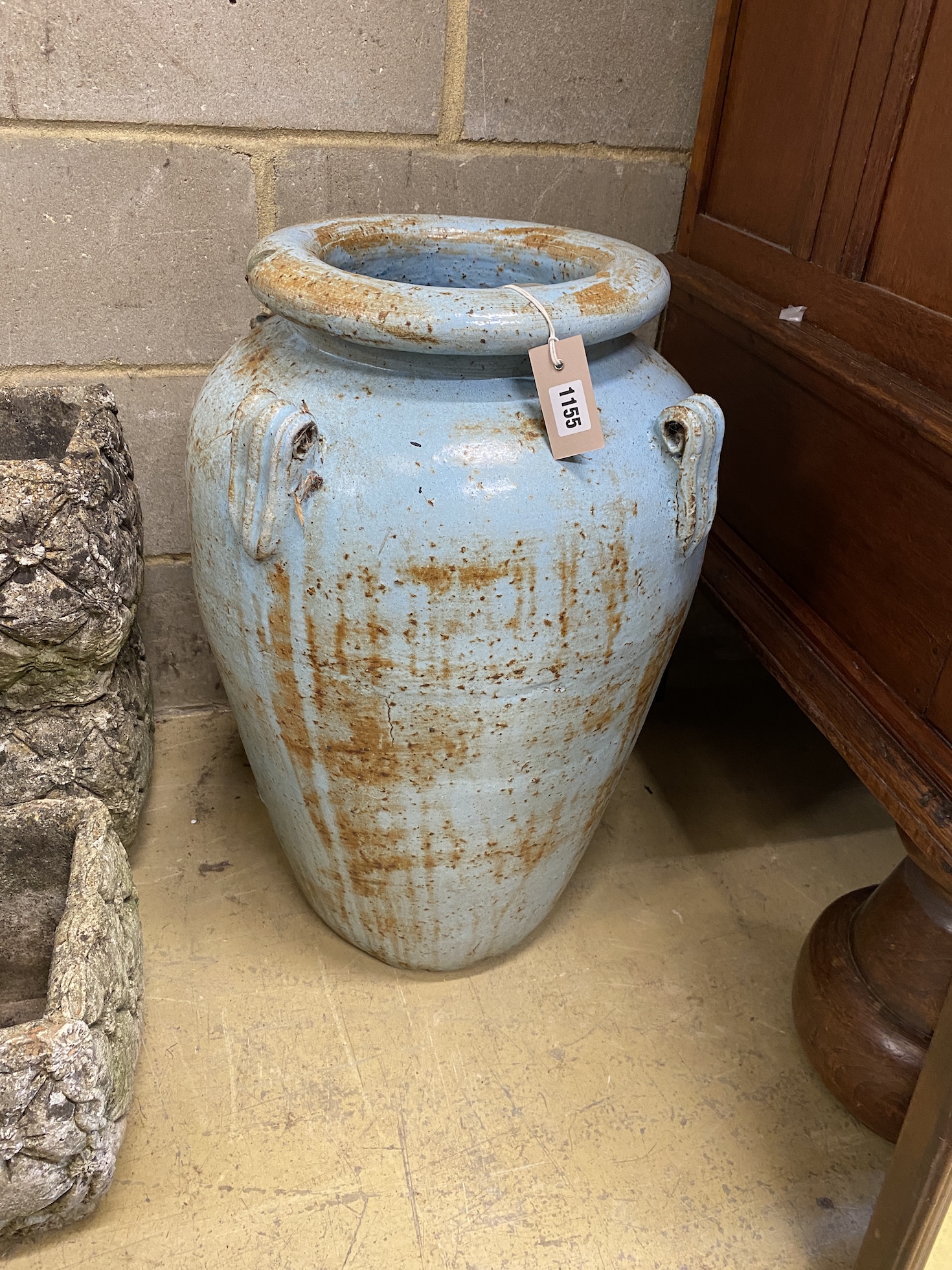 A blue glazed pottery garden urn, height 66cm